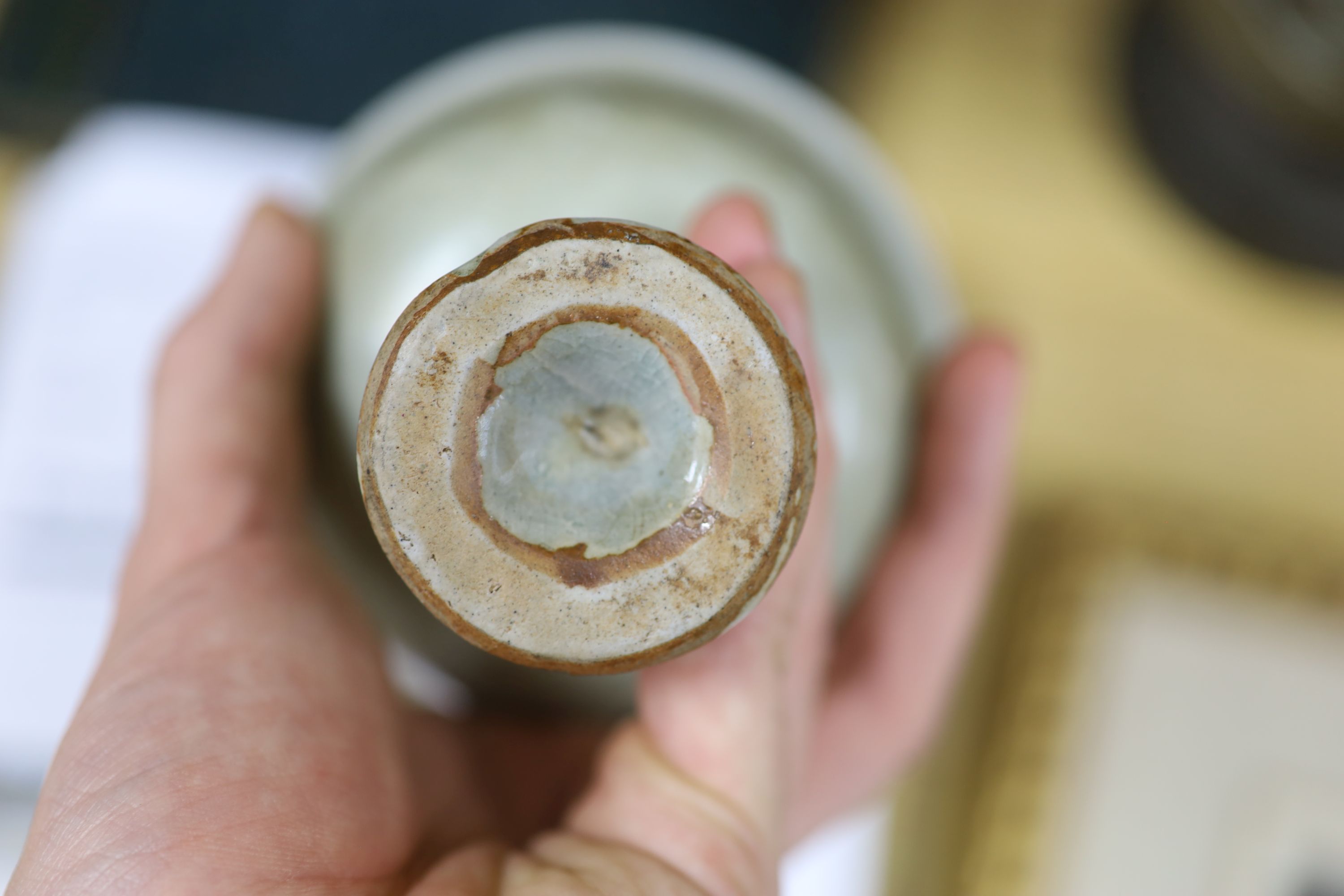 A Chinese blue and white bowl, diameter 15cm, a tea bowl and saucer, a crackleglaze shell dish and a celadon glazed stem cup